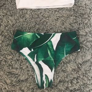 High waisted swim bottoms and black top